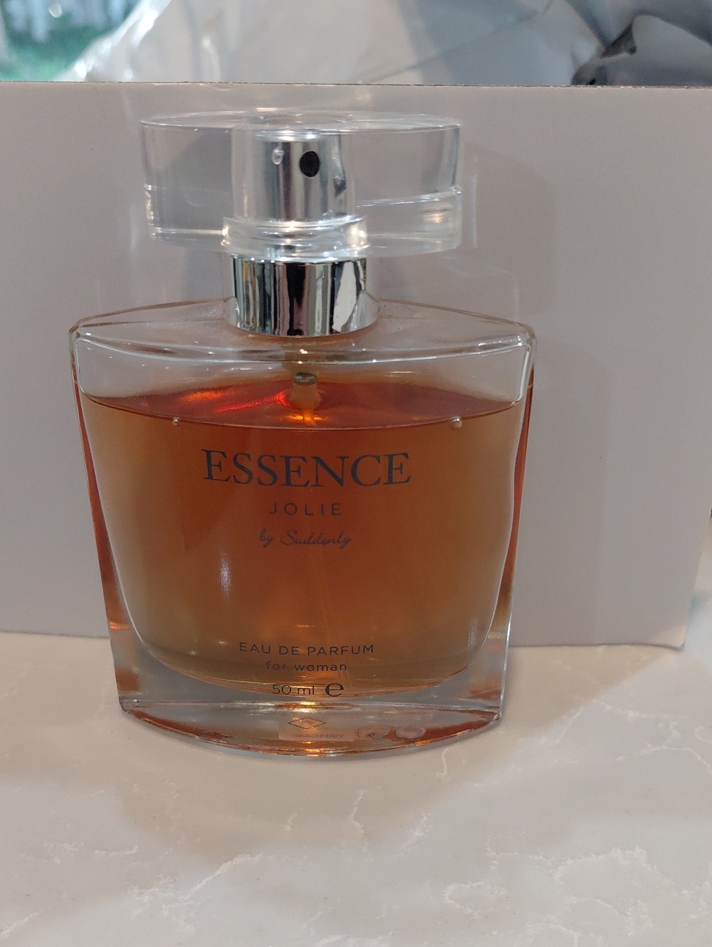 Amber Liquid Fragrance in Oval Clear Glass Bottle